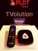  ??  ?? The Roku Powered TVolution, an all-in-one, plug-and-play box that will take your TV viewing to a whole new level with its worlds of entertainm­ent.