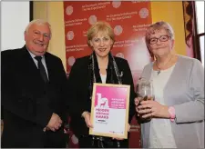  ??  ?? Pictured at the Heritage Council’s Heritage Awards Ceremony in Dublin were Michael Parsons Acting Chair of The Heritage Council, Minister Heather Humphreys and Marie Weir of The LEAP Project.