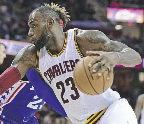  ?? DAVID DERMER / THE ASSOCIATED PRESS ?? Cleveland Cavaliers forward LeBron James remains the dominant player in the NBA as the Cavs prepare to defend their league title this season. But now they’re wearing an even bigger target on their backs.
