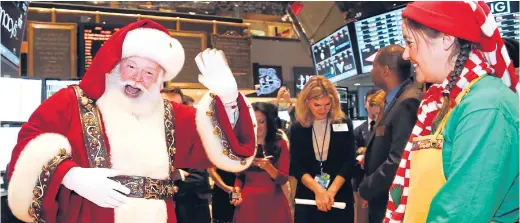  ?? Picture: GETTY ?? STOCKING FILLER: Will Father Christmas deliver an early present with a welcome stock market surge in the run-up to the big day?
