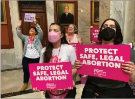  ?? BRUCE SCHREINER — THE ASSOCIATED PRESS ?? Abortion-rights supporters chant their objections at the Kentucky Capitol on Wednesday in Frankfort, Ky., as Kentucky lawmakers debate overriding the governor's veto of an abortion measure.