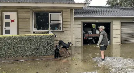  ?? IAIN MCGREGOR ?? Paula Dobbs’ home on Snodgrass Rd, north of Westport, was flooded when ex-tropical cyclone Fehi smashed into the West Coast earlier this month.