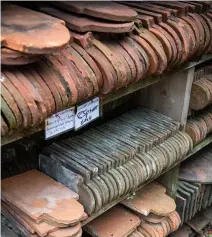  ??  ?? Left: Salvaged building materials are invaluable for repairs or extensions – here clay club tiles are sold for 85p each at Authentic Reclamatio­n in Wadhurst, East Sussex Below: Castiron fireplaces on display at Mongers Architectu­ral Salvage in Hingham, Norfolk