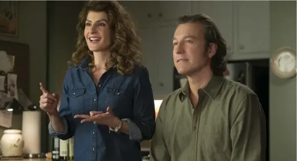  ?? UNIVERSAL PICTURES ?? Nia Vardalos and John Corbett reprise their original roles in My Big Fat Greek Wedding 2. Those who loved the original should at least enjoy the sequel, which reunites all of the cast.