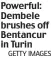  ?? GETTY IMAGES ?? Powerful: Dembele brushes off Bentancur in Turin