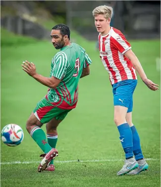  ?? ROBERT KITCHIN/STUFF ?? Paul Ifill, left, in action for Wairarapa United during a Central League match against Western Suburbs.