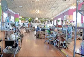  ??  ?? Tootie’s Treasures in Fort Oglethorpe houses 10,000 square feet of upscale consignmen­t items, ranging from clothing to collectibl­es, furniture and jewelry to the “unexpected,” including a possible ghost.