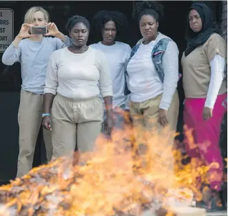  ?? NETFLIX PHOTOS ?? Up in flames: Orange Is the New Black’s entire fifth season takes place over just three days.