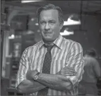  ?? The Associated Press ?? REPORTING: "The Post." Tom Hanks portrays Ben Bradlee in a scene from
