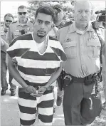  ?? CHARLIE NEIBERGALL/ASSOCIATED PRESS FILE PHOTO ?? LEFT: Cristhian Bahena Rivera is escorted to court Aug. 22 in Montezuma, Iowa. Rivera on Wednesday pleaded not guilty in the death of Mollie Tibbetts.