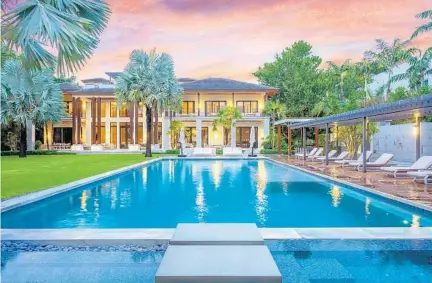  ?? DOUGLAS ELLIMAN REAL ESTATE/COURTESY PHOTOS ?? Russ Weiner’s 12,881-square-foot Miami Beach estate went on the market Sept. 25 for $35 million. He bought it in 2016 for just under $20 million.