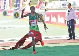  ?? /Gallo Images ?? Edward Mothibi wins the 94th Comrades Marathon on June 9 2019 in Durban.