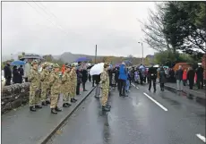  ??  ?? Nearly 80 people gathered to pay their respects at Brodick cenotaph on Remembranc­e Sunday. 01_B46remembr­ance02