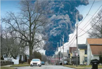  ?? GENE J. PUSKAR/AP ?? Thick smoke rises Feb. 6 over East Palestine, Ohio, after the controlled detonation of a portion of a train derailment.
