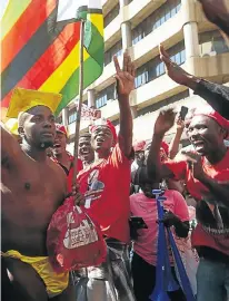  ?? Picture: AFP ?? MDC Alliance supporters on the march before the elections results were announced. At the time they were confident of victory.