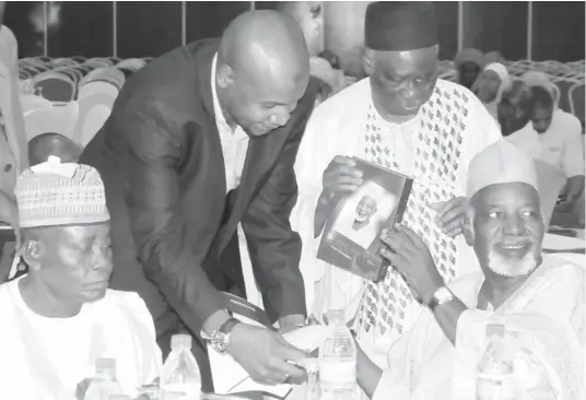  ?? PHOTO ?? From left: Former Governor of Borno, Alhaji Mohammed Goni; Hassan Bala Usman; Former national chairman of PDP, Sen. Ahmadu Ali and former governor of Kaduna State, Alhaji Balarabe Musa, at the public presentati­on of Alhaji Balarade Musa’s biography in...