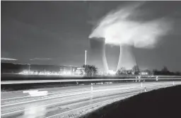  ?? JULIAN STRATENSCH­ULTE/DPA ?? Steam rises Dec. 29 from cooling towers of the Grohnde nuclear power plant. Grohnde is one of three such plants shuttered by Germany in December.