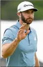  ?? GETTY ?? Dustin Johnson was able to get within one shot Sunday, but swirling winds caused a couple of bogeys down the stretch.