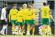  ??  ?? ON A ROLL: Norwich celebrate Kieran Dowell’s winner