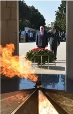 ?? (Ariel Hermoni, Ministry of Defense) ?? DEFENSE MINISTER Avigdor Liberman lays a wreath on the grave of the Jewish national hero, Albert Agaronov.