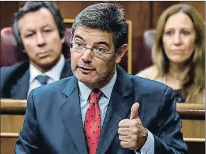  ?? EMILIO NARANJO / EFE ?? El ministro de Justicia, ayer, en la sesión de control al Gobierno