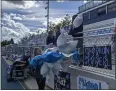  ?? ?? Leadership students provide more balloons Friday for the home side of the Pleasant Valley Stadium in Chico.