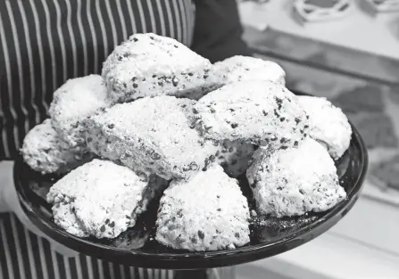  ?? BARBARA J. PERENIC/COLUMBUS DISPATCH ?? Sue Bissonnett­e’s chocolate chip scones.