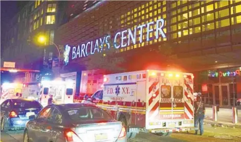  ?? AP ?? Ambulances gather outside Barclays Center after Gervonta Davis-Rolly Romero lightweigh­t championsh­ip bout Saturday night.