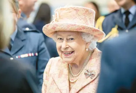  ?? RICHARD POHLE/THE TIMES ?? Queen Elizabeth II visits a Royal Air Force training center in King’s Lynn, England. She died Thursday.