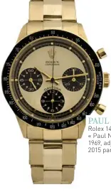  ??  ?? PAUL NEWMAN Rolex 14k Gold Cosmograph Daytona « Paul Newman » , réf. 6241, n° 2084320, 1969, adjugée 359 000 dollars le 27 juin 2015 par Antiquorum.