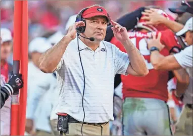  ?? Usa Today sports — dale Zanine ?? Georgia coach Kirby Smart looks on from the sidelines during the Bulldogs’ win over Kentucky last week at Sanford Stadium.