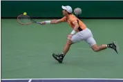  ?? MARK J. TERRILL — THE ASSOCIATED PRESS ?? Andy Murray, of Britain, hits a return to David Goffin, of Belgium, during their match at the BNP Paribas Open tennis tournament Wednesday, March 6, 2024, in Indian Wells, Calif.