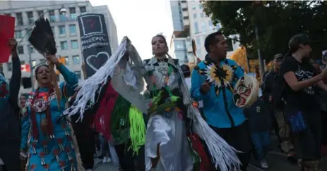  ?? JESSE WINTER/TORONTO STAR ?? Hundreds of protesters gathered at Queen’s Park Saturday afternoon to show solidarity for those opposing the Dakota Access Pipeline in the U.S.