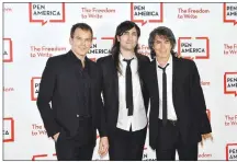  ?? (AFP via Getty Images/TNS/ Angela Weiss) ?? Actor and musician Michael C. Hall (left) and his bandmates of Princess Goes to the Butterfly Museum are shown in New York in 2021. The band is embarking on its first national tour but skipping most of the South.