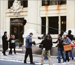  ?? Christian Abraham / Hearst Connecticu­t Media file photo ?? The Hallmark Channel film “Love in the Newsroom” being produced in downtown Bridgeport on Oct. 4, 2016.