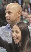  ?? STAFF PHOTO BY MATT STONE ?? ENJOYING LIFE: Alex Cora and his daughter Camila take in a Celtics game.