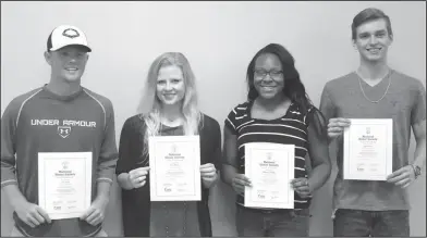  ??  ?? Twelfth grade: Junction City High School students who maintained a 3.5 GPA were recognized with National Honor Society membership­s. They are, from left, Joe Lowe, Kaci Mason, Chakeenia Malone and Logan Vines.