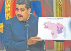  ?? AP ?? ACOSADO. Maduro busca reducir la presión internacio­nal contra su gobierno, mientras quiere renegociar una pesada deuda externa.