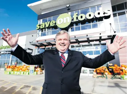 ?? Calgary Herald/files ?? Overwaitea Food Group President Darrell Jones was on hand during the final preparatio­ns for the opening of the new Save On Foods store in which Calgary community in October? See question 33.