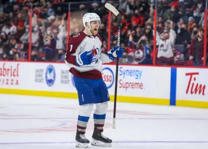  ?? Chris Tanouye, Getty Images ?? The Avalanche’s Devon Toews cheers after scoring against the Senators in the third period at Canadian Tire Centre on Saturday in Ottawa, Ontario.