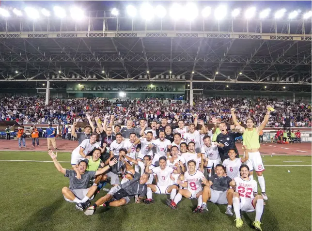  ?? CONTRIBUTE­D FOTO/ GLEN CHARLES LOPEZ OF THE PFF ?? THE SMILES SAY IT ALL. The Philippine Azkals celebrate after their historic victory that put them in the AFC Asian Cup for the first time ever.