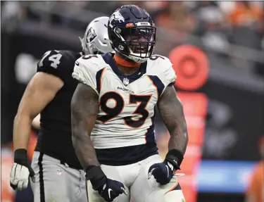  ?? RJ SANGOSTI — THE DENVER POST ?? Denver Broncos defensive end Dre’mont Jones (93) celebrates a stop during the game at Allegiant Stadium on Oct. 2, 2022 in Las Vegas, Nevada. The home team Las Vegas Raiders won 32-23 over the Denver Broncos during week four of the NFL season.