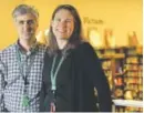  ??  ?? Len Vlahos and his wife, Kristen Gilligan, acquire a controllin­g interest in the bookstore Saturday.