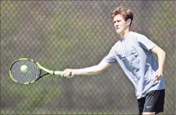  ?? Jeremy Stewart / RN-T ?? Model’s Micah Veillon connects for a shot during his No. 1 doubles match in the Region 7-AA tournament finals against Rockmart on Tuesday at the Rome Tennis Center at Berry College.