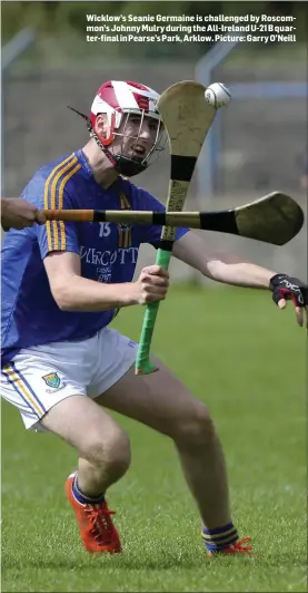  ??  ?? Wicklow’s Seanie Germaine is challenged by Roscommon’s Johnny Mulry during the All-Ireland U-21 B quarter-final in Pearse’s Park, Arklow. Picture: Garry O’Neill