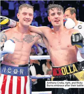  ??  ?? Anthony Crolla, right, and Ricky Burns embrace after their battle
