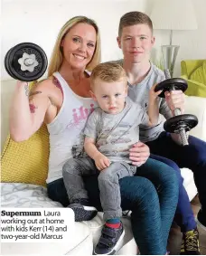  ??  ?? Supermum Laura working out at home with kids Kerr (14) and two-year-old Marcus