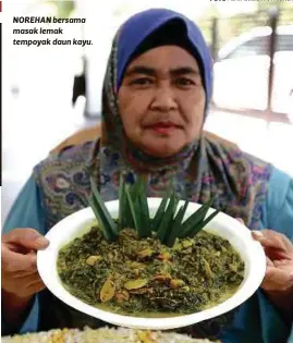  ?? FOTO | SAIFULLIZA­N TAMADI ?? NOREHAN bersama masak lemak tempoyak daun kayu.