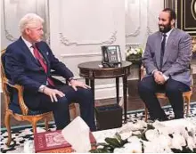  ?? AFP ?? ■ Prince Mohammad Bin Salman with former US president Bill Clinton during a meeting in New York.