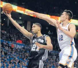  ?? Photo: USA TODAY SPORTS ?? Seven-foot symphony: Oklahoma City centre Steven Adams contests the shot of San Antonio opposite Tim Duncan during yesterday’s playoff game.